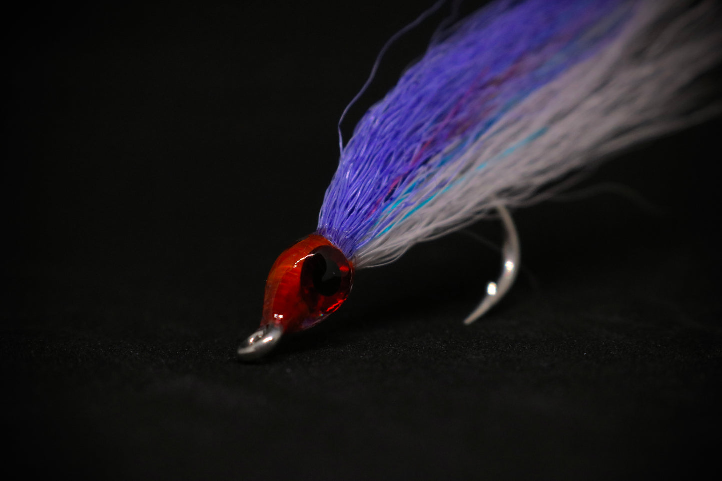 Purple and White Fly