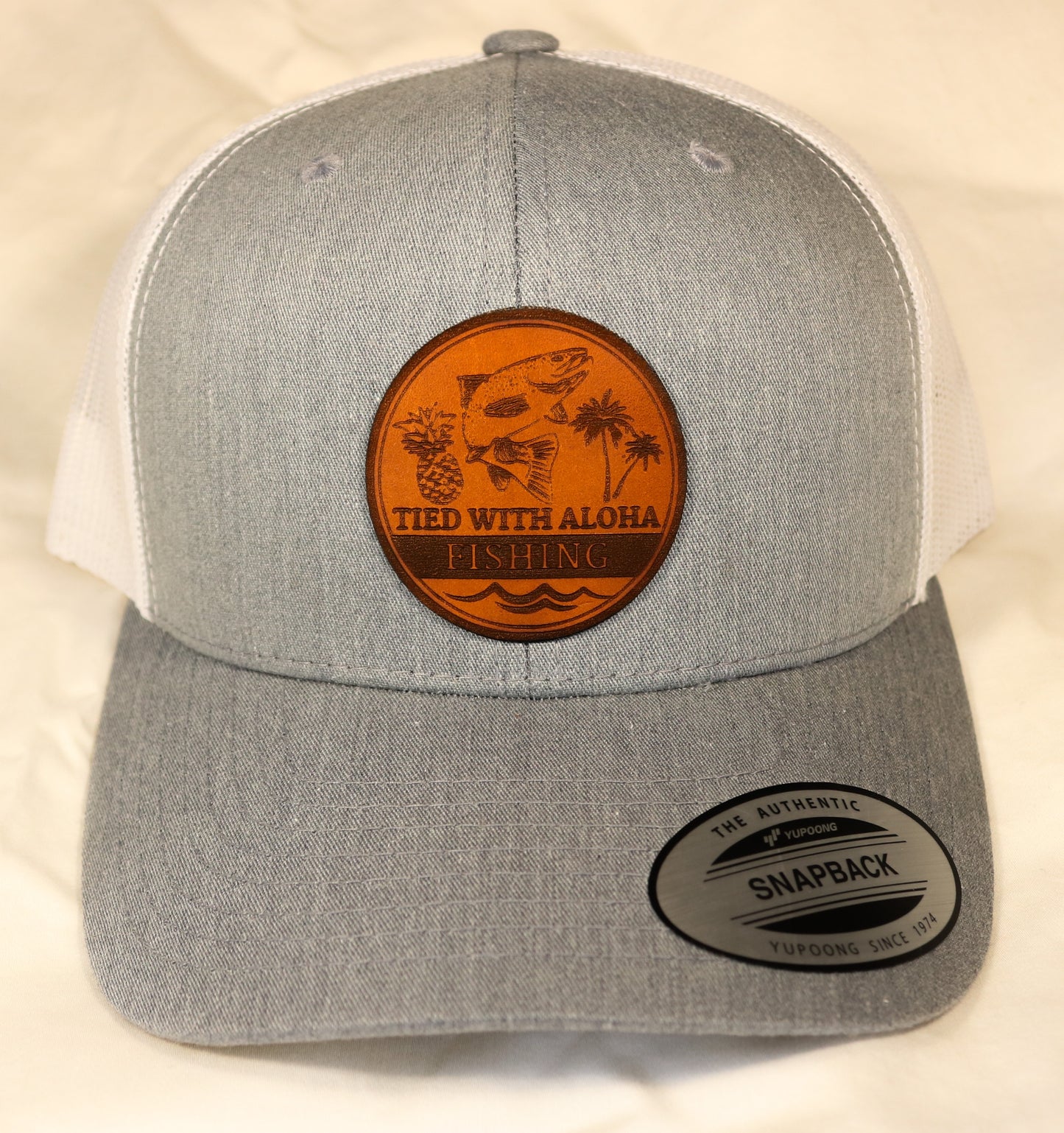 Tied with Aloha Custom Leather Patch Trucker Hats